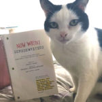 Pebbles poses with Now Write! Screenwriting: Screenwriting Exercises from Today's Best Writers and Teachers 