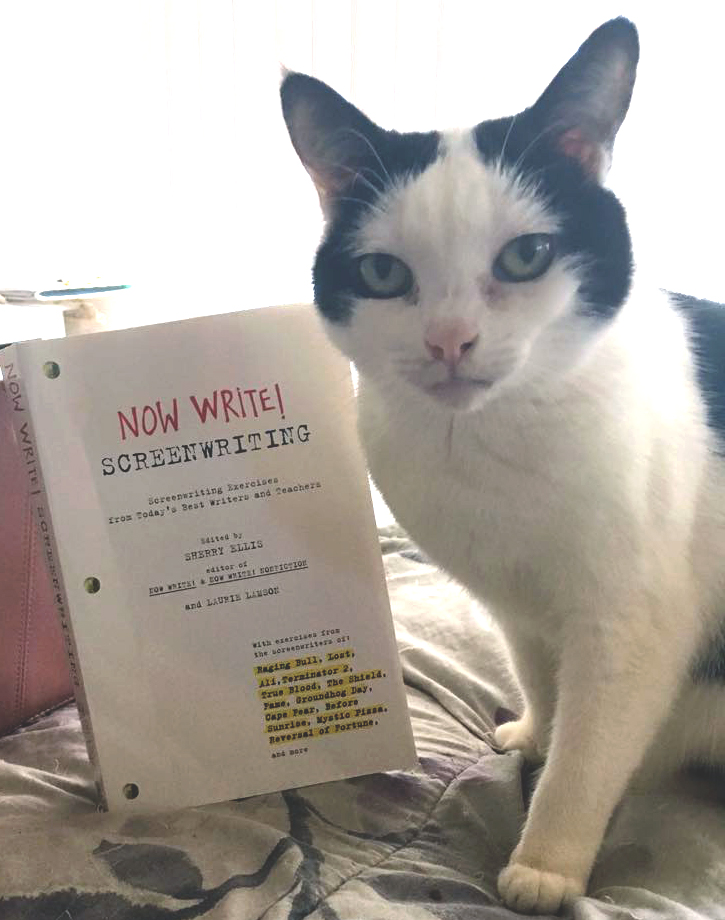 Pebbles poses with Now Write! Screenwriting: Screenwriting Exercises from Today's Best Writers and Teachers